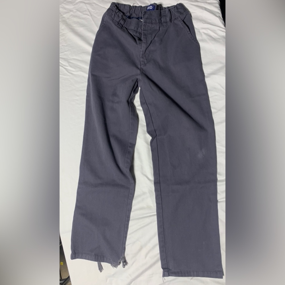 Worn gray pants